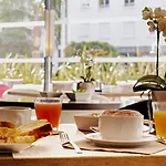 Le Canberra Hotell